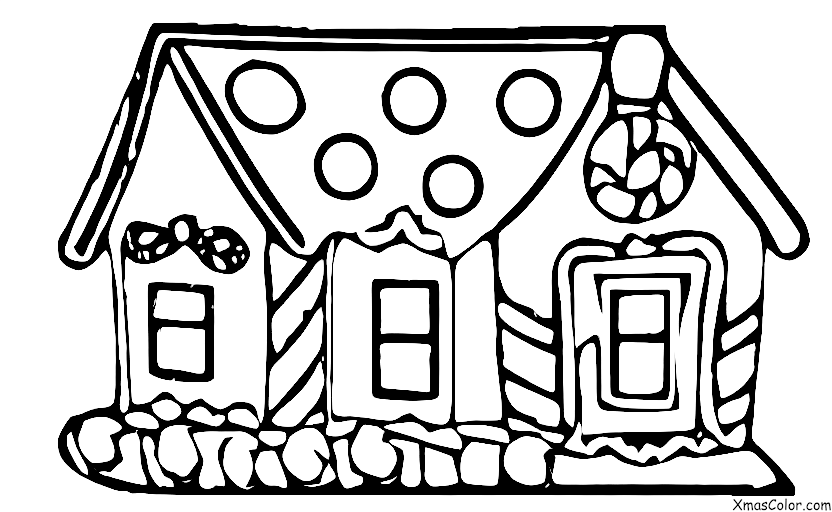 Christmas / Christmas cake: A rectangular shaped Christmas cake with a gingerbread house on it